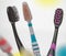 Close up shot of set of multicolored toothbrushes
