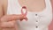Close up shot of silk pink ribbon. Pink october concept breast cancer awareness month