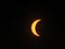 Close-up shot of solar eclipse on black background seen from the Shady Grove Baptist Church, Belton