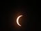 Close-up shot of solar eclipse on black background seen from the Shady Grove Baptist Church, Belton