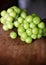 Close-up shot of some string of green grapes.