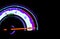 Close up shot of a speedometer in a car. At an engine speed of 6000 rpm on Car dashboard.Car Interior ilumination.â€‹Colorfulâ€‹