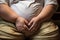 close-up shot of a sumo wrestlers hands gripping the mawashi