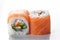 Close up shot Sushi rolls with salmon and caviar on a white background