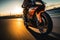 Close up shot of a tire of a motorcycle going on the road with a motion blur.