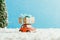 close-up shot of toy car with christmas present riding by snow made of cotton