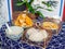 Close up shot of traditional breakfast with steamed bread, congee