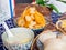 Close up shot of traditional breakfast with steamed bread, congee