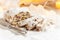A close-up shot of traditional Christmas stollen fruit cake. Sweet gift for Christmas. Selective focus.