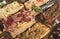 Close up shot of variety of homemade pizza slices. Rectangular portions. Italian food. Assortment of homemade pizzas