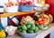 Close-up shot of vibrant vegetables in old tray bowls on shelves