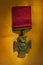 Close up shot of Victoria Cross medal on golden background