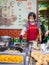 Close up shot of woman deep frying oyster