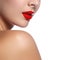 Close-up shot of woman lips with glossy red lipstick. Glamour re