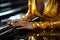 A close-up shot of a woman\\\'s hands adjusting the shiny latex fabric, capturing the tactile and alluring nature of the dress.