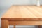 Close up shot of of wooden table top with visible texture. Home interior decoration natural materials