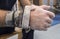 Close up shot of a working white male\'s hands covered in white substance