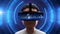 Close-up shot of a young man wearing VR Headset experiencing 3D virtual reality on digital background.