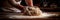 Close-up shots of a baker& x27;s hands expertly kneading dough, shaping bread .