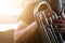 close-up shots of male musicians Who are playing the euphonium blower in the selected marching band