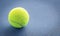 Close-up shots of tennis rackets and tennis balls With light and soft On a tennis court with a beautiful shiny background For maki