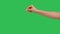Close up side view of beautiful outstretched female hand with a sprinkling gesture isolated on green screen chroma key