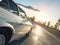 Close up of side view of car on the asphalt road, car driving on the highway