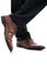 Close-up of side view leather brown elegant man shoes