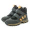 Close up side view of warm winter sports boots for men on a white background.