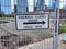 Close up of a Sidewalk Closed Ahead Sign in front of Bellevue construction site at 555 108th Avenue NE, neat the transit center