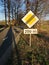 Close-up of sign indicating the end of priority road