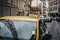 Close up of a sign on yellow taxi on a street in Prague, Czech Republic