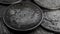 Close-up Silver Coin Rotating on a Wooden Table. Spinning American Dollars Coin