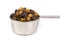 Close up silver measuring cup containing fruit mincemeat mix