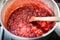 Close up of a simmering homemade strawberry jam.