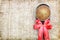 Close up single banana cup cake bakery top view on wood ladle with big red bow look delicious on wooden table background