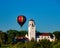 Close up of a single hot air balloon and the train depot in Boise Idaho
