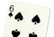 Close up of a six of spades playing card.