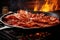 close-up of sizzling bacon in a frying pan