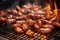 close-up of sizzling sausages on a bbq grill