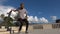 Close up of skater skateboarder man beautifully jumps off a skateboard in flight