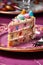 close-up of a slice of birthday cake on a plate