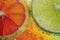 Close Up of Slice of Lemon and Lime, Vibrant Citrus Fruits in Focus, A bold and vibrant symphony of electric lime and fiery
