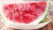 close up of slice of water melon on a plate