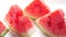 close up of slice of water melon on white background .