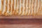 Close-up of sliced bread. Rustic looking on wooden board background.