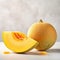 A close up of a sliced melon on a table