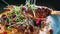 Close-up of slicing the appetizing roasted duck with fork and knife