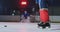 Close-up slow motion hockey puck kick and flying snow. A spectacular blow