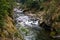 Close-up of the slow water flow of a mountain stream